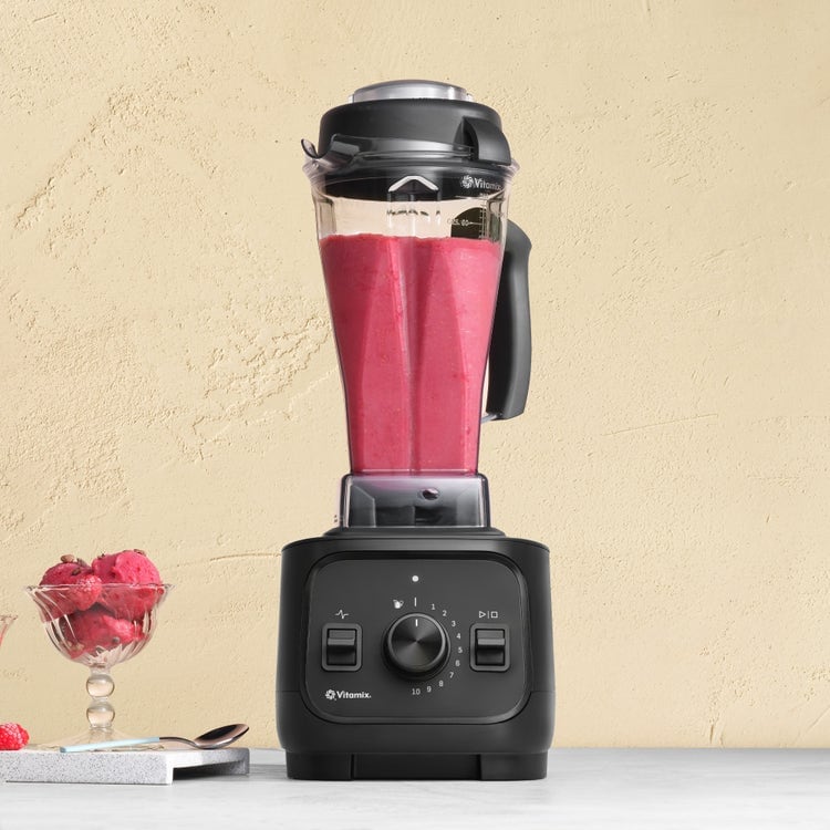 VX1 blender on countertop with smoothie scoops in bowl