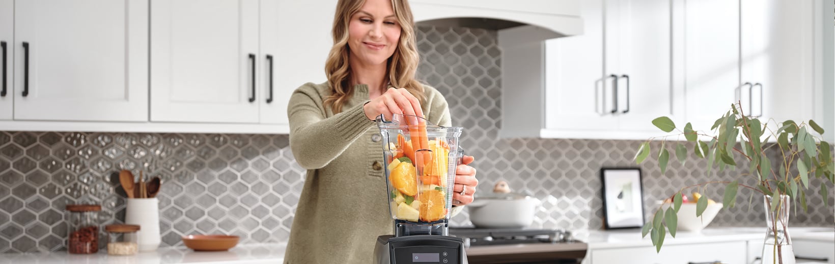 Image of Woman Using Blender