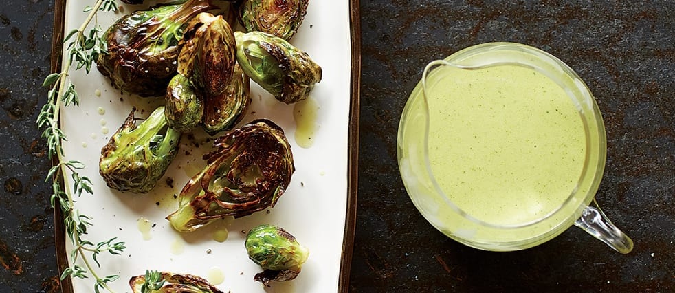 Roasted brussel sprouts with a side of dressing