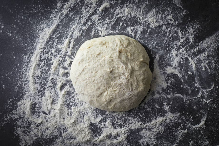 pizza dough ball on counter